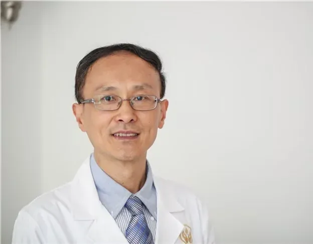 Dr. Yu Qi - Licensed Acupuncturist & Massage Therapist